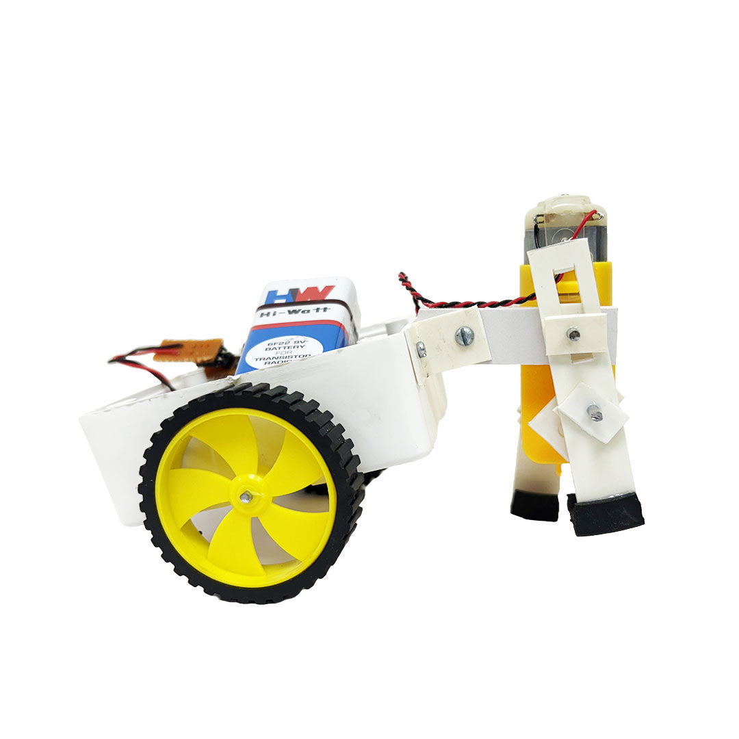 A small white robotic cart with yellow wheels and various electronic components, including wires and a motor, is displayed against a plain background. Perfect for those eager to build their own robot or dive into experimental movement.